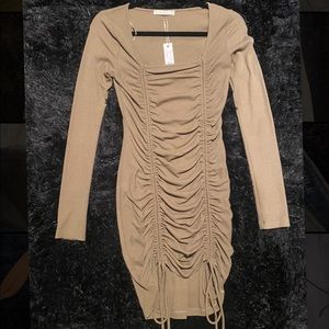 From a local boutique. Olive green tight dress. Never worn.